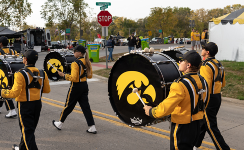 Tyler Kennedy marching with other band members