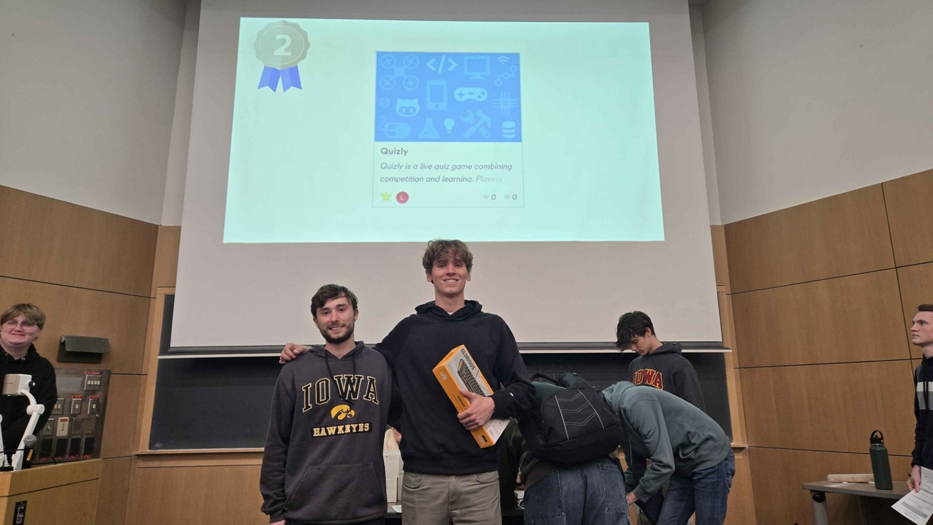 Allen and Liam recieving their prizes for second place