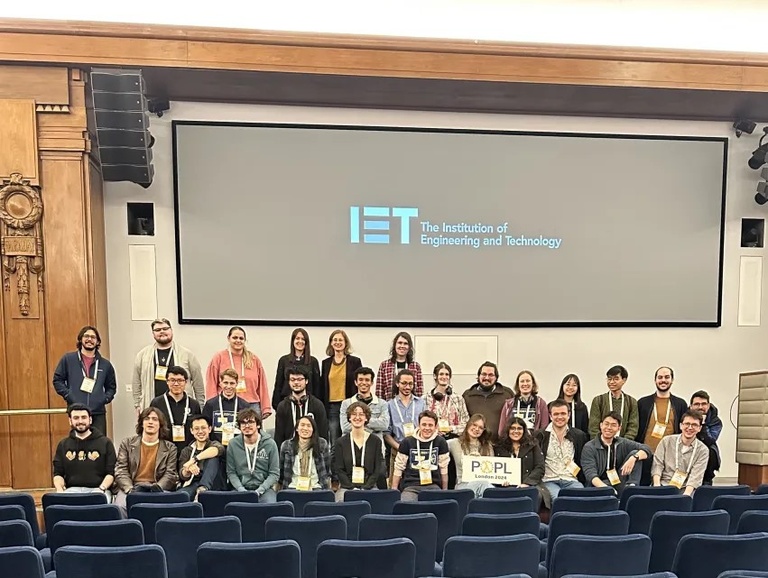 Ingle (standing, first on the left) and the Organizing Committee for POPL 2024. This year’s conference took place in the Institution of Engineering and Technology (IET) in Savoy Place, London.