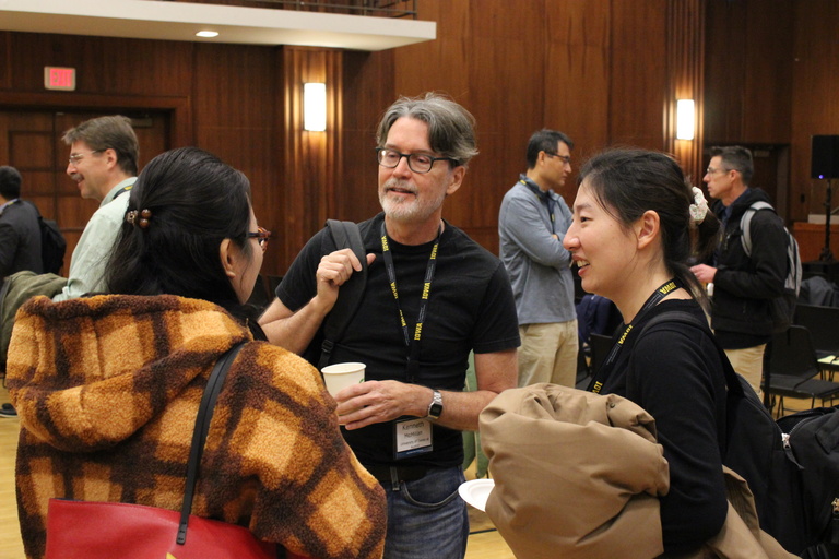 Attendees socializing during a break