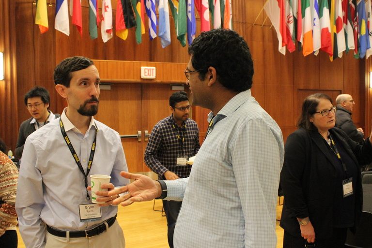 Attendees socializing during a break