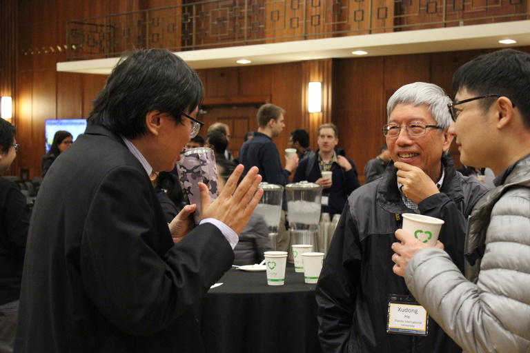 Attendees socializing during a break