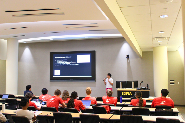 ISU and Uiowa Symposium Jacob Langewisch presenting