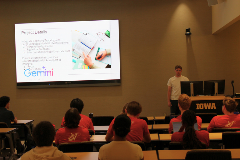 ISU and Uiowa Symposium student presenting