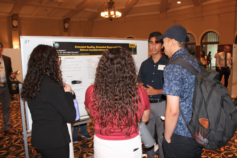 Ethen Santana presenting at SURC