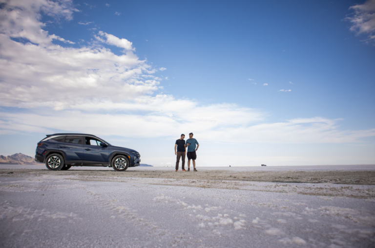 Cinematic shot of Osama and Hussam planning trip