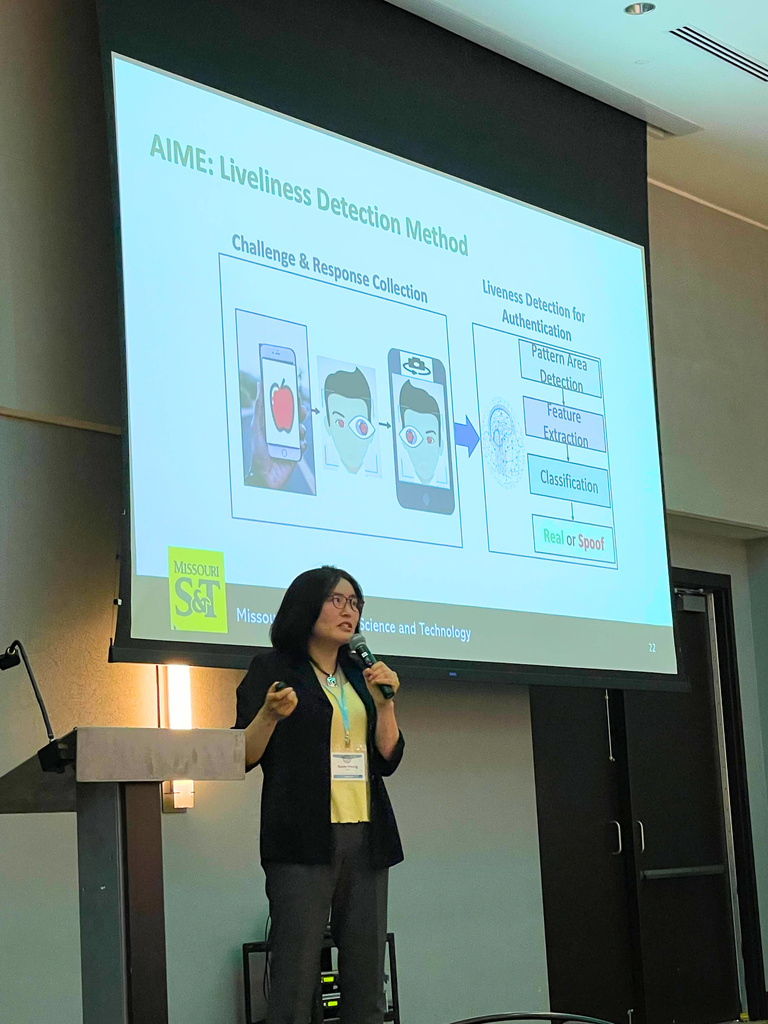 Dr. Baek Young Choi presenting as keynote speaker at MINK WIC