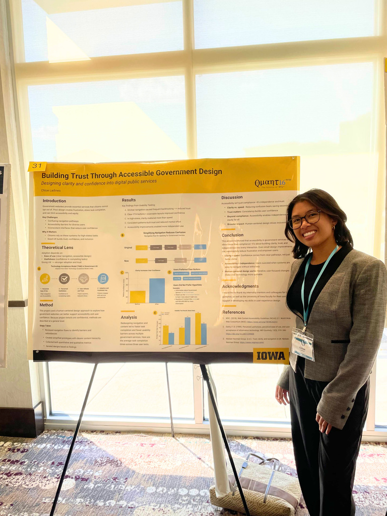 Chloe Ladines presenting research poster at MINK WIC