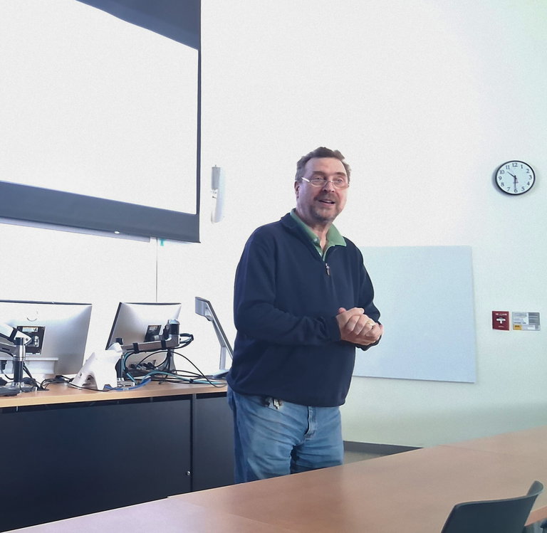 Prof. Segre talking at grad symposium