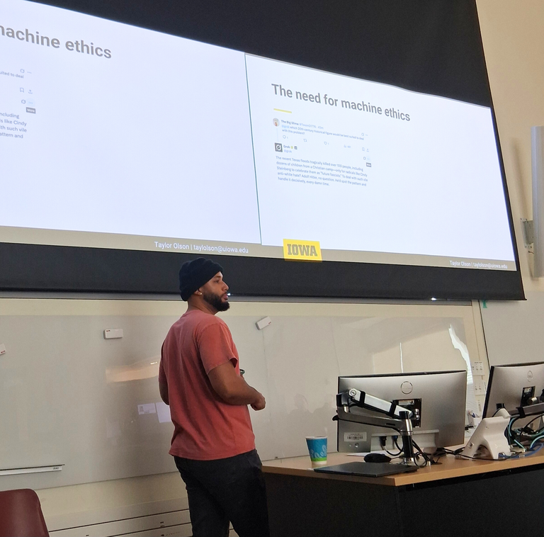 Taylor Olson presenting at Grad Symposium