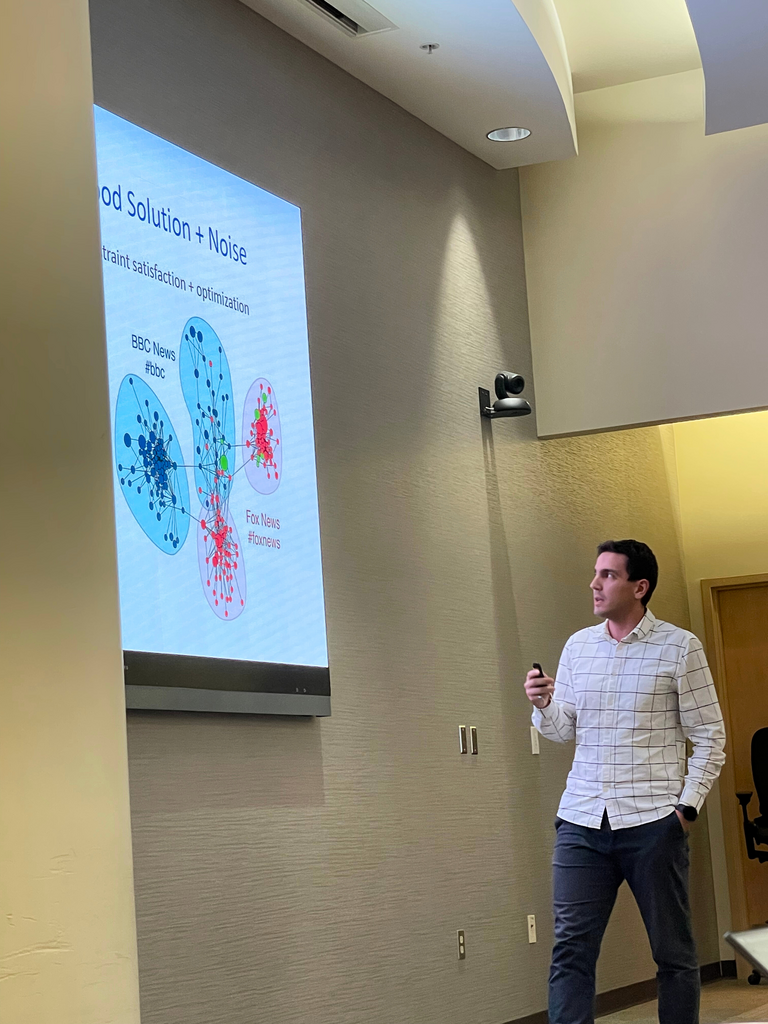 Mehrdad Moharrami presenting at grad symposium