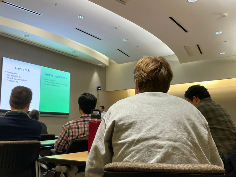 Student listening to Mehrdad Moharrami keynote