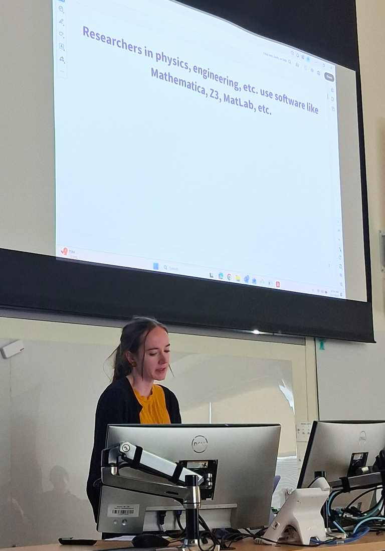 Prof. Kossian presenting at Grad Symposium