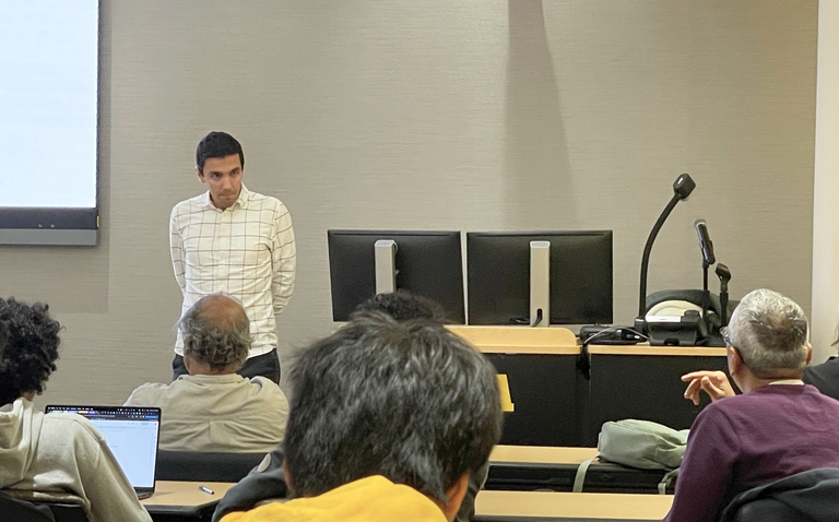 Mehrdad Moharrami conversing with Professor Pemmaraju