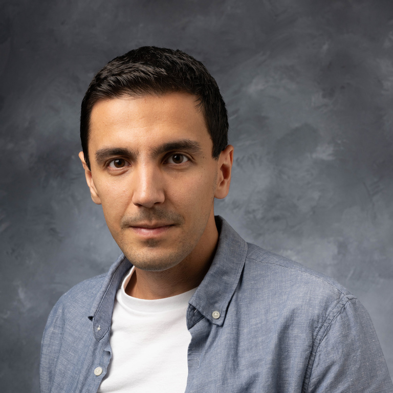 Mohammed Moharrami portrait in front of Old Capitol Building - Photo Credit: MBiger