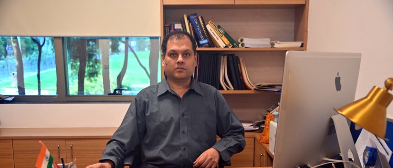 Shrisha Rao picture at his IIIT Bangalore desk - Credit: Swathi Sharma, IIIT Bangalore
