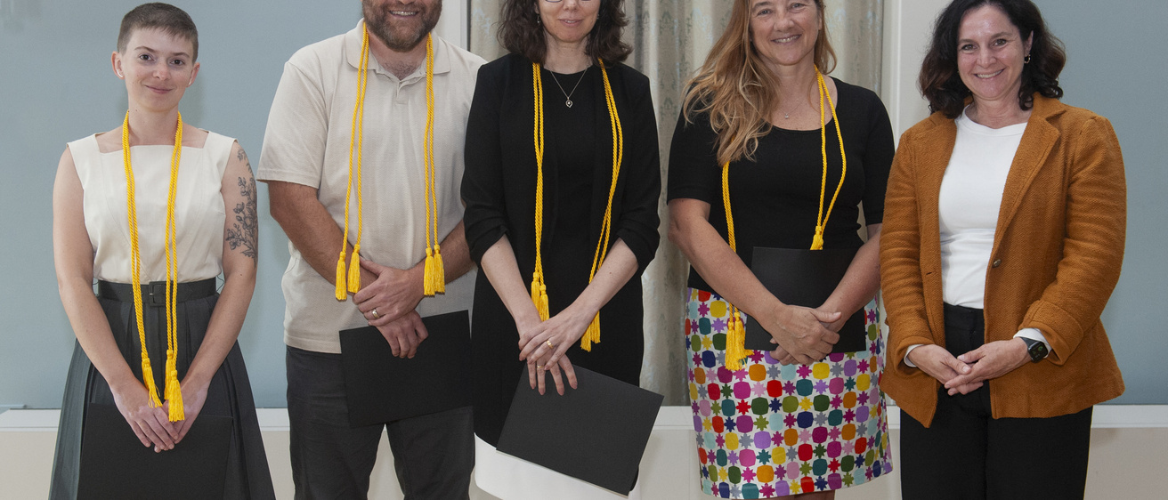 Elizabeth Kleinman in group photo at the Faculty Honors Award Ceremony