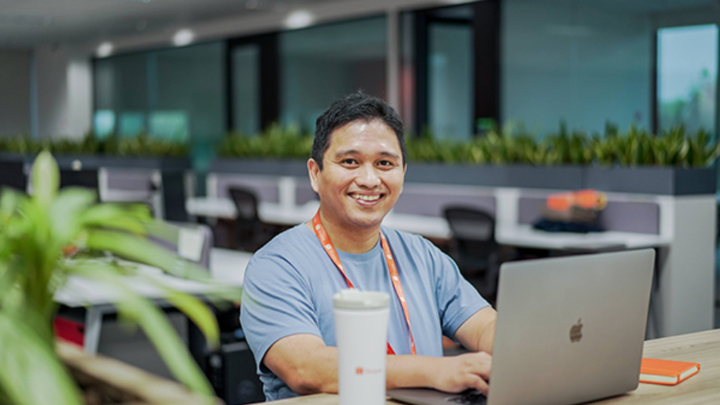 Cuong making use of the co-working space at Shopee