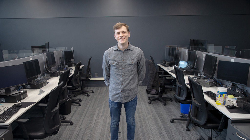 University of Iowa student Ben Stone poses for a portrait inside of a research center in the Belin Blank Honors Center on May 5, 2022.  Photo credit: Daniel McGregor-Huyer - The Daily Iowan
