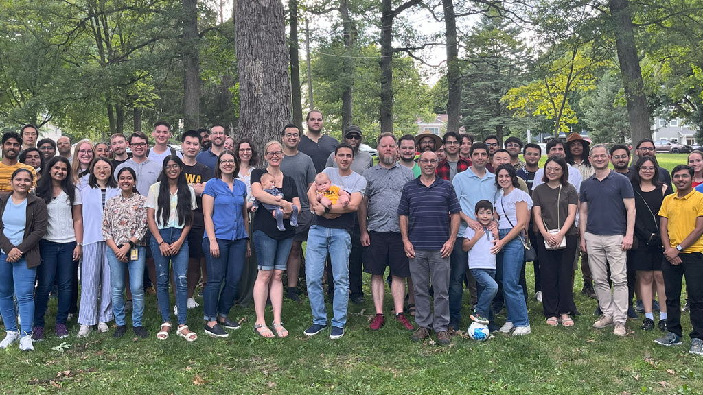 Group picture of UIowaCS grad students, faculty, and staff attending Fall 2024 Welcome Picnic at Upper City Park, Iowa City, IA